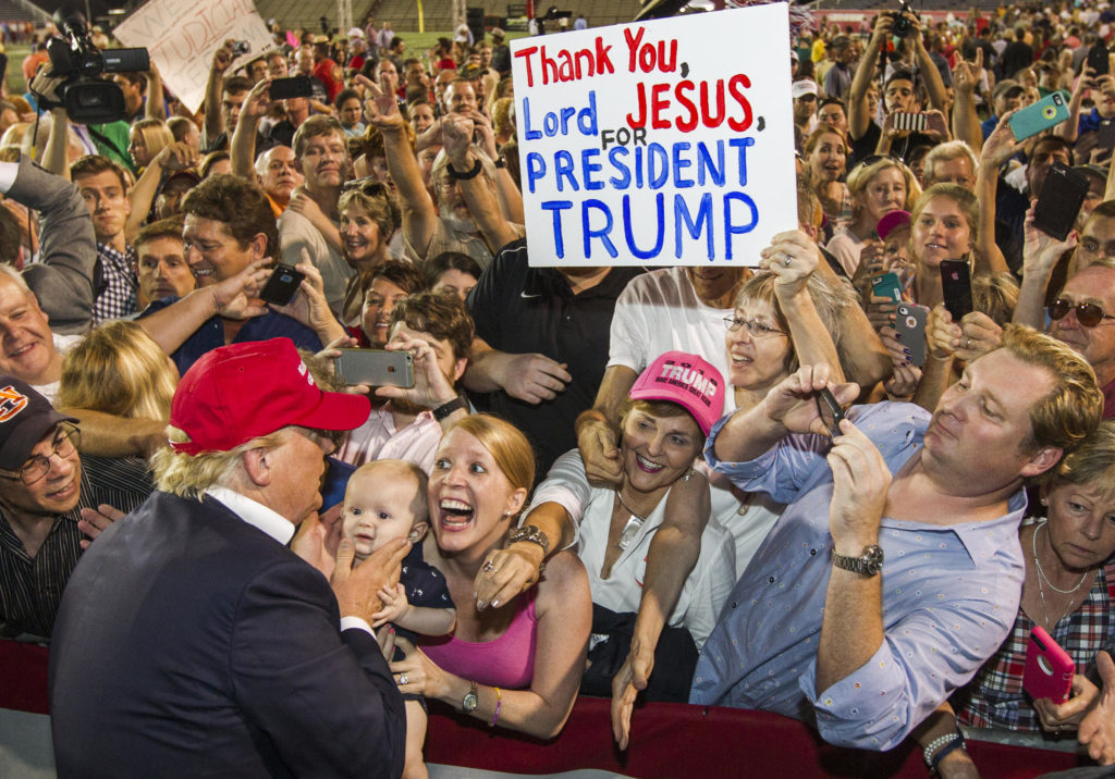 Enthusiastic supporters greet Donald Trump at a rally of more than 30,000 in Mobile, Ala., in August.